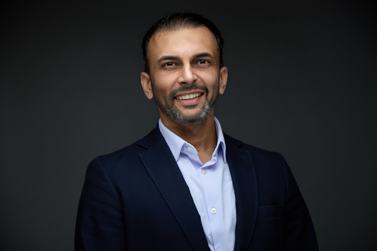 Headshot of Qasim Rashid, Creator